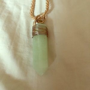 Never used green crystal stone and gold chain.